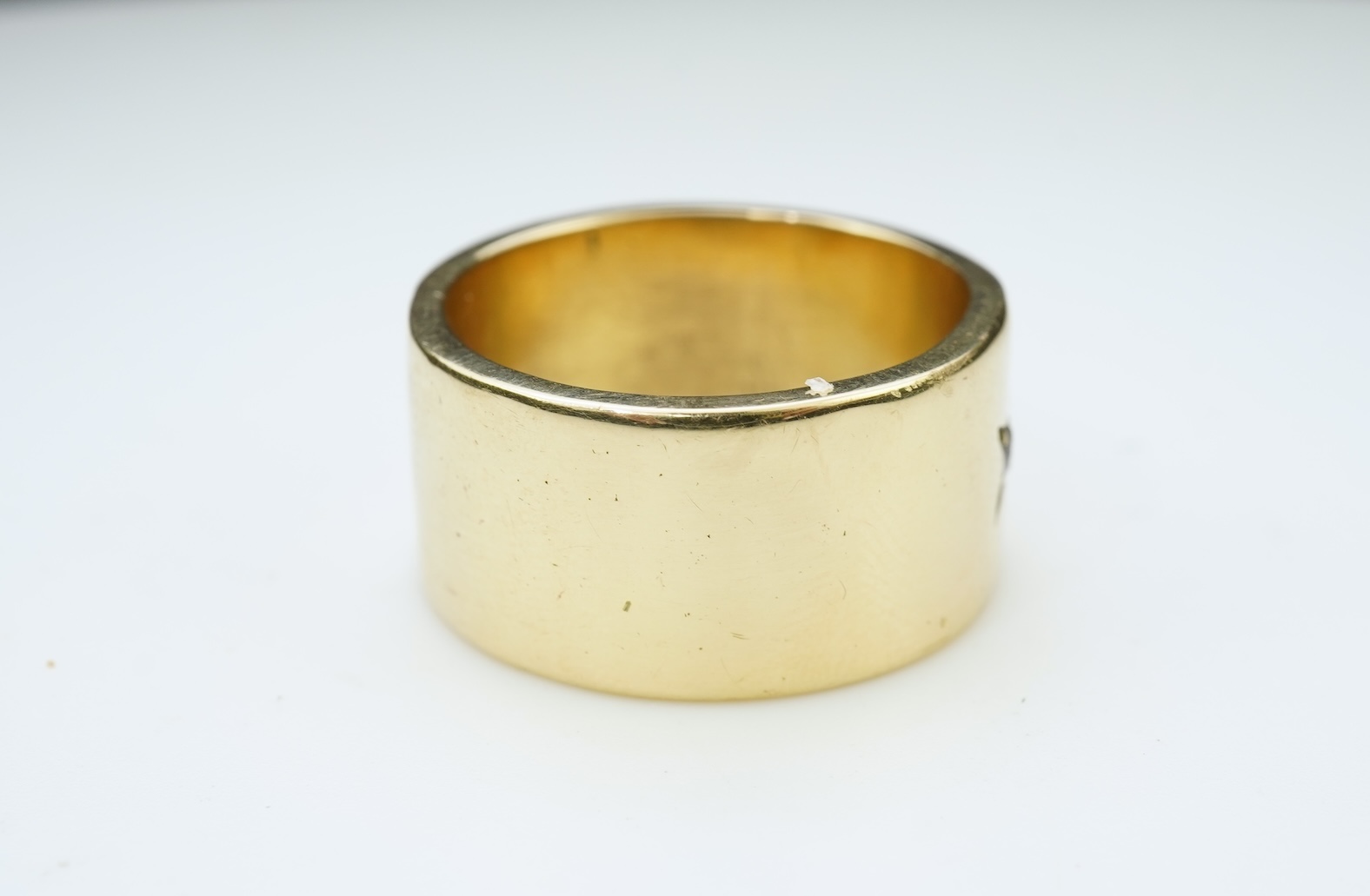 A gold and diamond ring